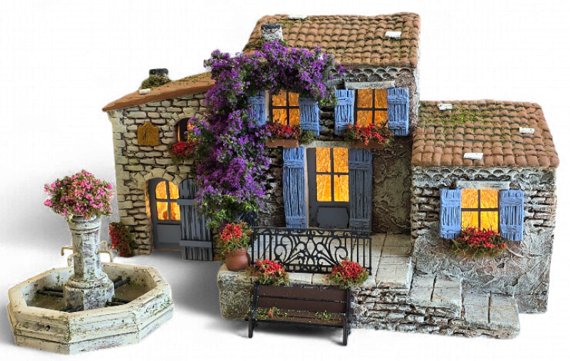 Crèche provençale artisanale réalisée avec des santons de Provence faits main et des décors miniatures inspirés des villages de Provence à Aubagne.