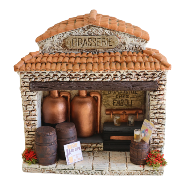 Crèche de Noël provençale composée de santons en argile et décors de village inspirés de la Provence