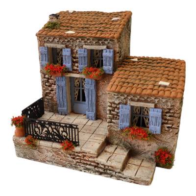 Crèche de Noël provençale avec santons artisanaux et maisons de village miniatures