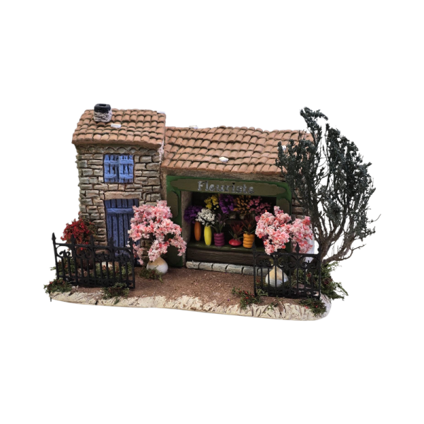 Détail d’une fontaine miniature provençale réalisée à la main pour une crèche de Noël authentique