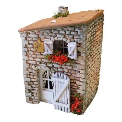 Scène de village provençal avec décors artisanaux et figurines en argile